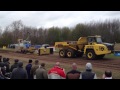 Dump truck pulling sledge at tractor pull