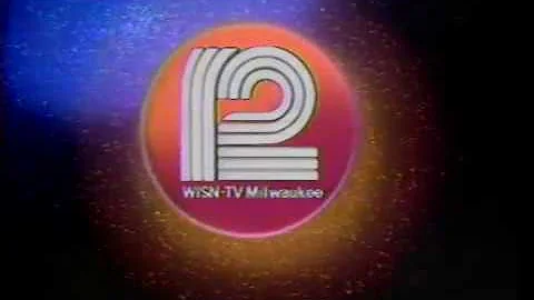 WISN 12 - Top of Hour Ident and Monday Night Movie bumper [10 sec] (1985)