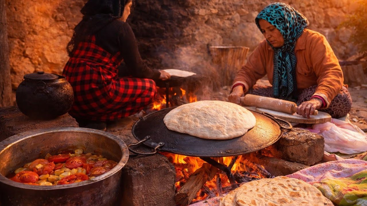 village life in Iran; traditional baking bread on the wood fire