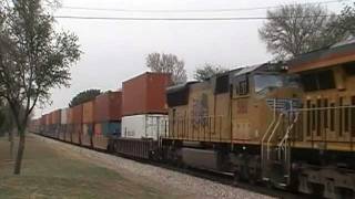 Union Pacific#7381,5180,7445 on dpu,leads westbound double stack train.  Abilene,Tx.    12/10/11
