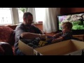 Unwrapping a tamiya txt with an excited little boy