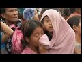 Typhoon Haiyan survivors desperate to leave as warships join relief effort