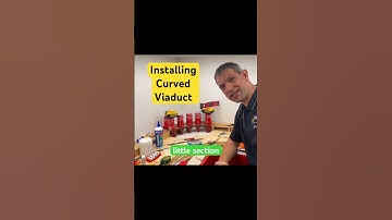 Painting installing curved viaduct model train set