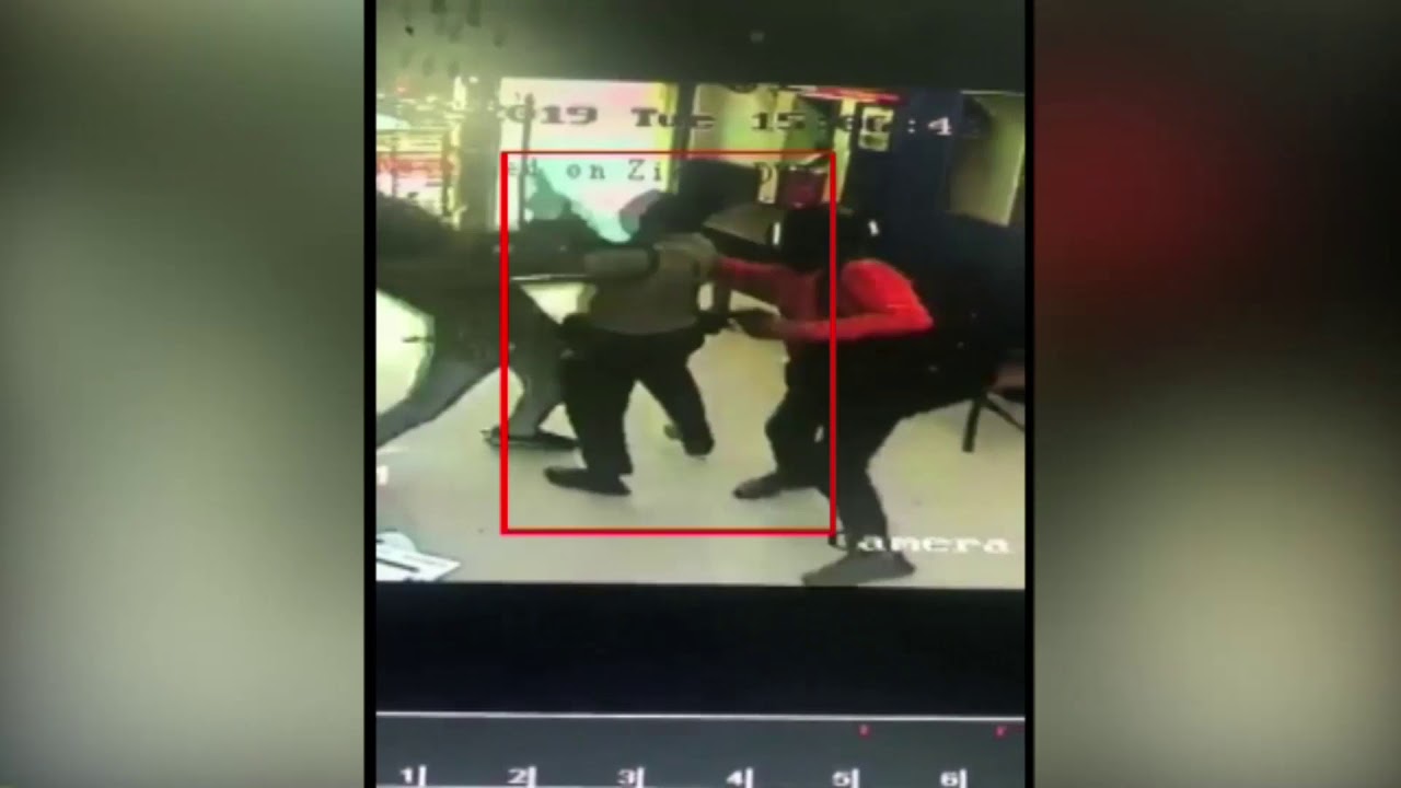 Bank Robbery Foiled! Brave Security Guard Confronts Gunmen