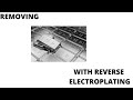 removing silver coating with reverse elecroplating using salt and vinigar