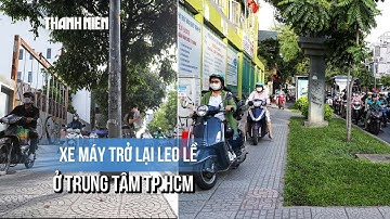 6 tháng từ Nghị định 168: Xe máy thản nhiên leo lề ở trung tâm TP.HCM
