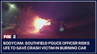 Bodycam: Southfield police officer risks life to save crash victim in burning car