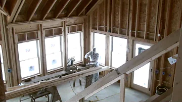 Spray foam Insulating the angled ceiling of a cabin in Northern Wisconsin (HD)