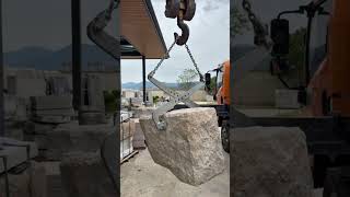 Anchor transport machine that can lift natural stone blocks for wall installation #construction