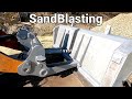 POV sandblasting loading shovel arms and bucket real time