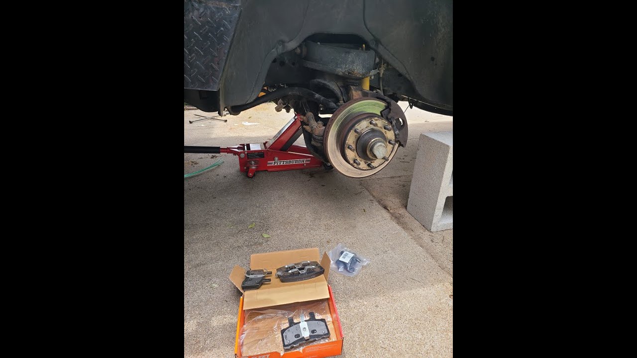 2nd Gen Ram Front Brake Pad Replacement - YouTube