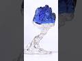 Largest cut tanzanite - 703.4 carats (140.68 g) by Naomi Sarna