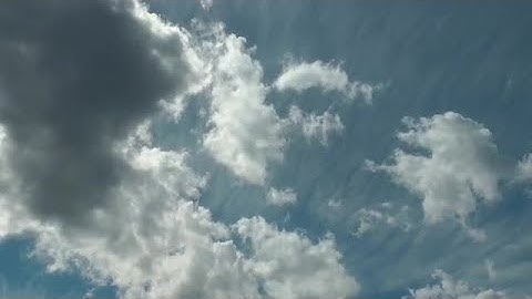 Rain Clouds With Lens Flare Stock Footage