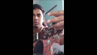 How do you tune a guitar with a tuner (mob) ?| Malayalam | Spairo Inc.