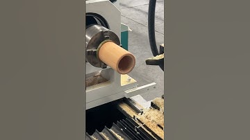The automatic CNC wood lathe processed a bamboo cup. You only need to make simple settings to start