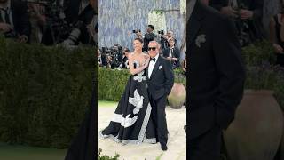 Anne Hathaway arrives with Michael Kors at the 2026 Met Gala