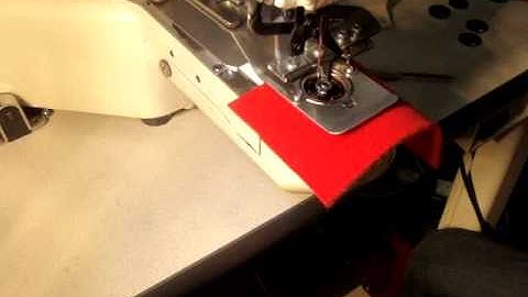 Automatic press stud attaching machine