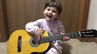Kendra plays guitar for the first time