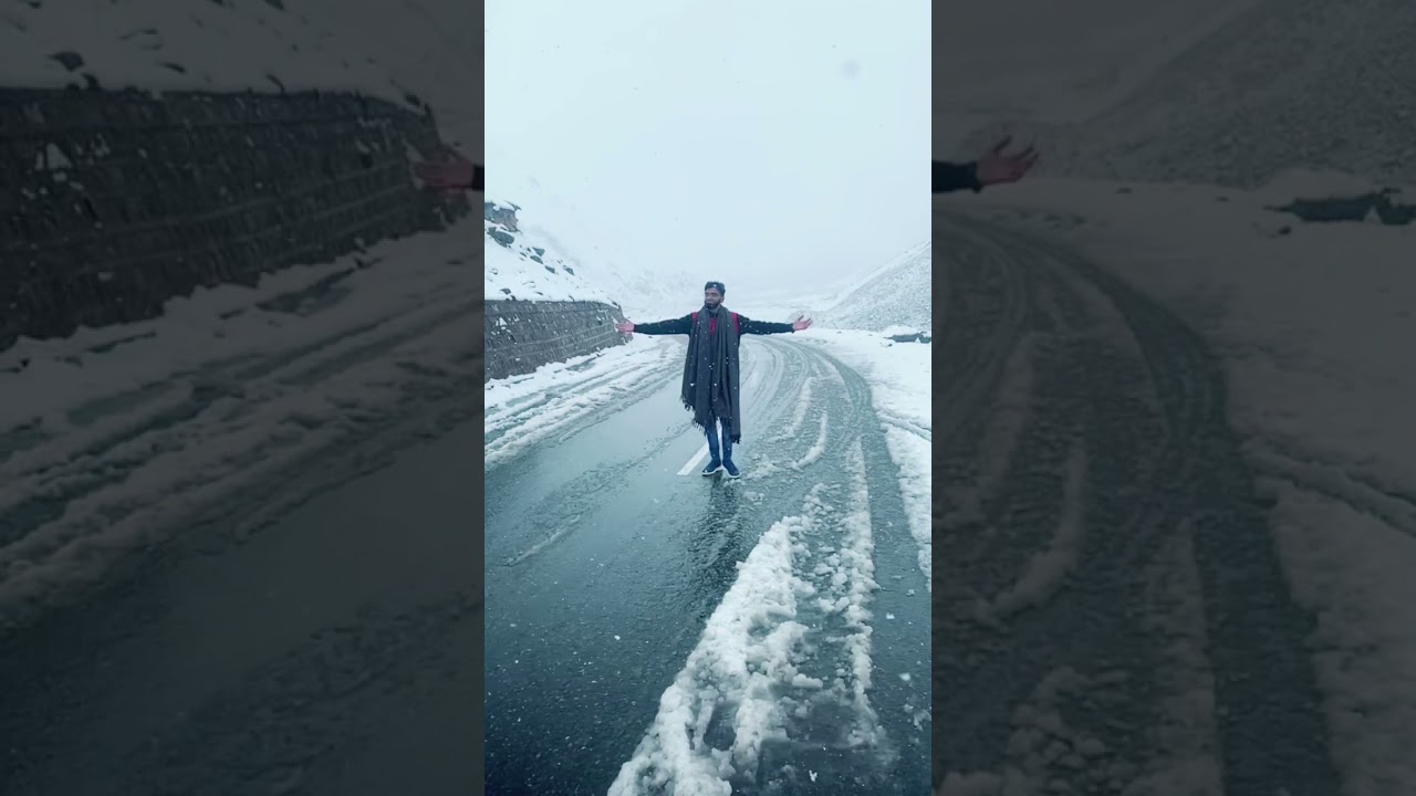 Snow falling babusa top