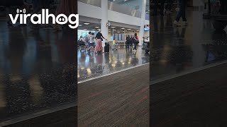 Family Rides Scooter Suitcases Through Airport || Viralhog