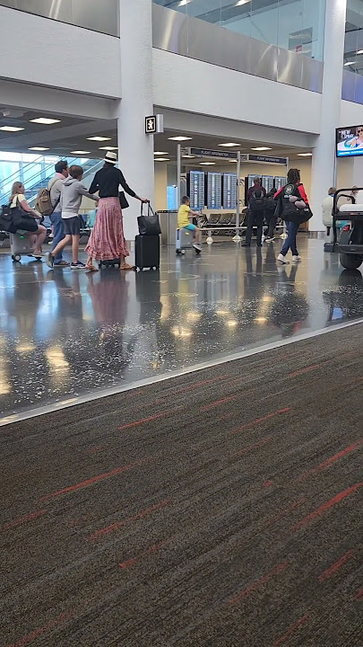 Family Rides Scooter Suitcases Through Airport || ViralHog