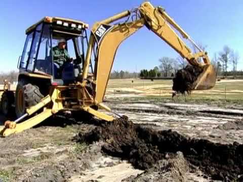 Video: Hvad er bommen på en rendegraver?