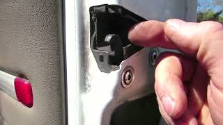 96 Chevy Tahoe driver's door won't open. Try this 1st! I got mine open without destroying anything.