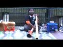 Techno music performed by an aboriginal with a didgeridoo at Circular Quay Sydney Harbour