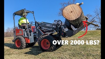 Compact wheel loader action - Intrepid KM130 Tele miniloader with powerful log grapple (tree care)