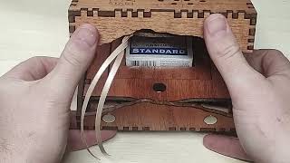 Opening the large travel cribbage board