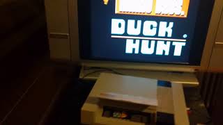 NES console game cartridge loading method