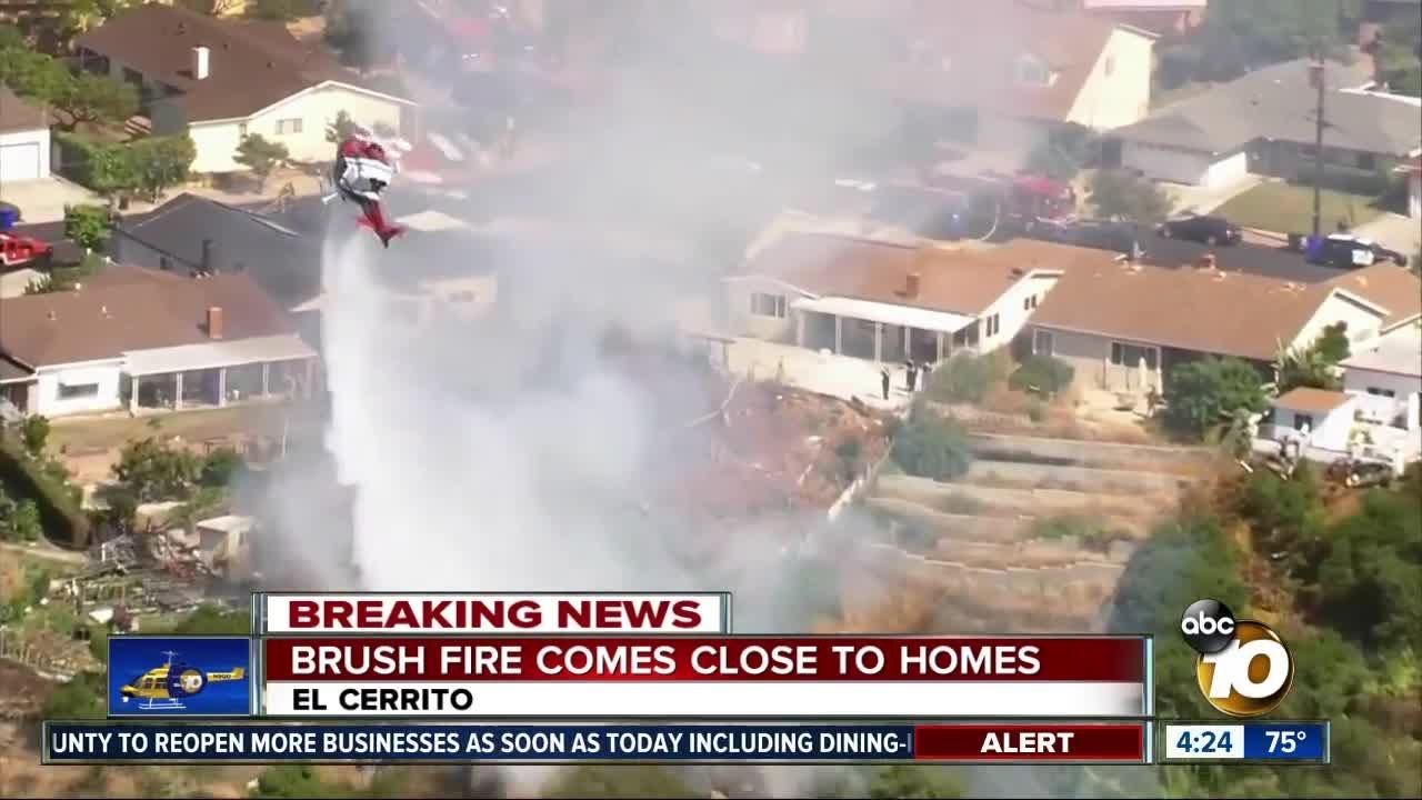 Brush fire comes closes to homes - YouTube