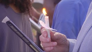 John Lewis' 'good trouble' legacy remembered with candlelight vigil