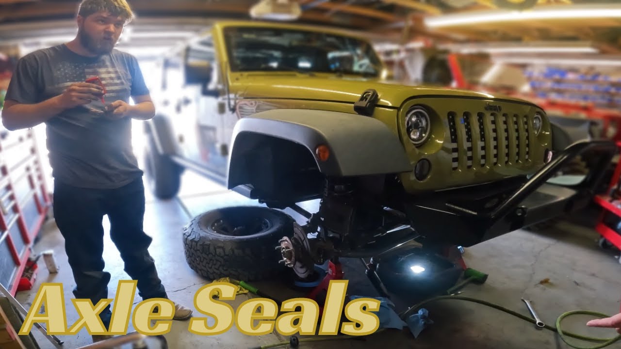 Replacing front axle seal on Jeep Wrangler - YouTube