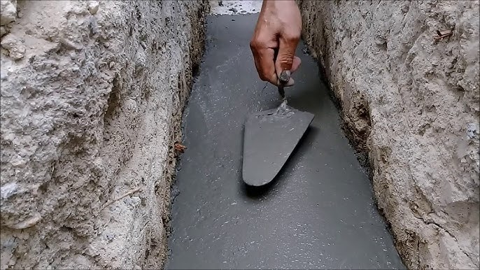 5.Muro de arrimo com pedra bruta para segurar o talude do terreno