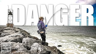 DANGER JETTY FISHING searching for  Striped Bass , Fluke , Bluefish Surf Fishing Inlets Long Island