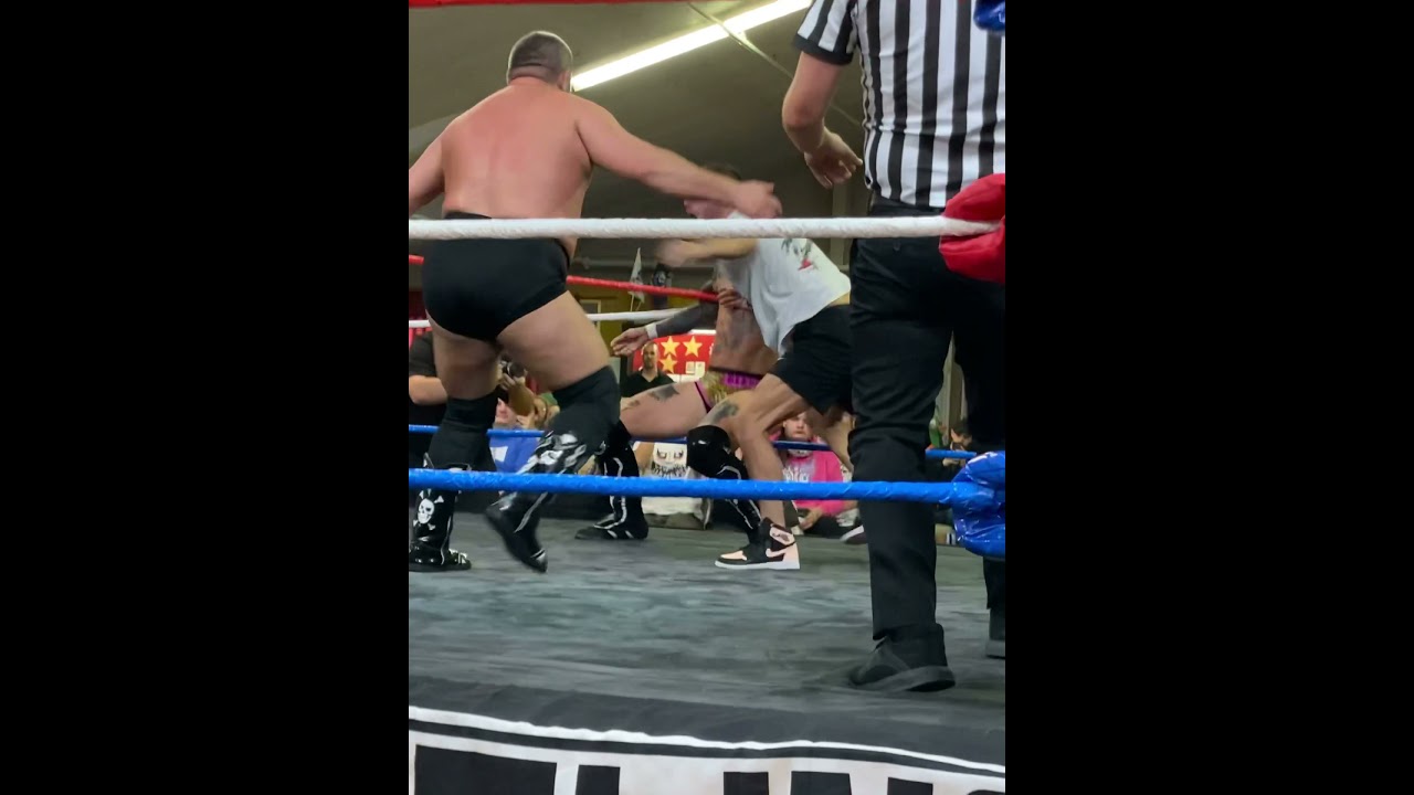 Jd drake tosses Garcia out of the ring.