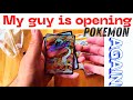 My friend opens Pokemon packs with me