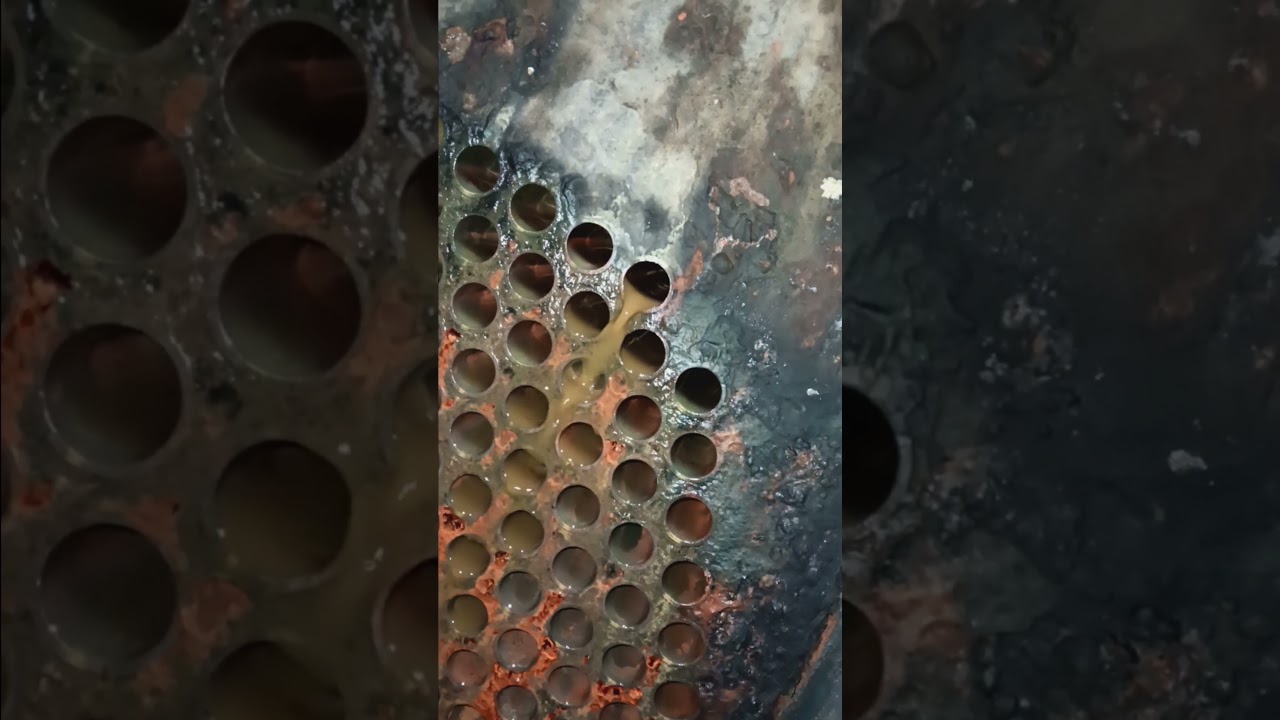 More tube brushing Trane chiller evaporator tubes.