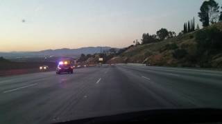 Cop swerves side to side to shut down 6-lane highway