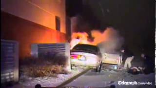 US police rescue teenager from burning car