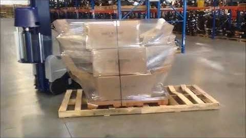 Robot S6 portable semi-automatic stretch wrapper wrapping automotive parts - Robopac USA