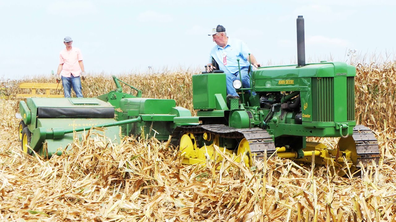 John Deere 60 Crawler with John Deere 224WS Baler in the field Baling Corn
