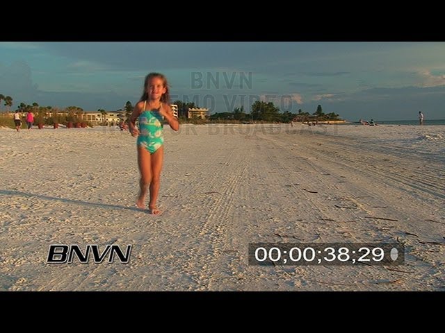 9/7/2007 Beach Goers running on the beach in Florida.