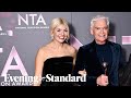 Watch moment holly willoughby and phil schofield are booed by crowd at national television awards