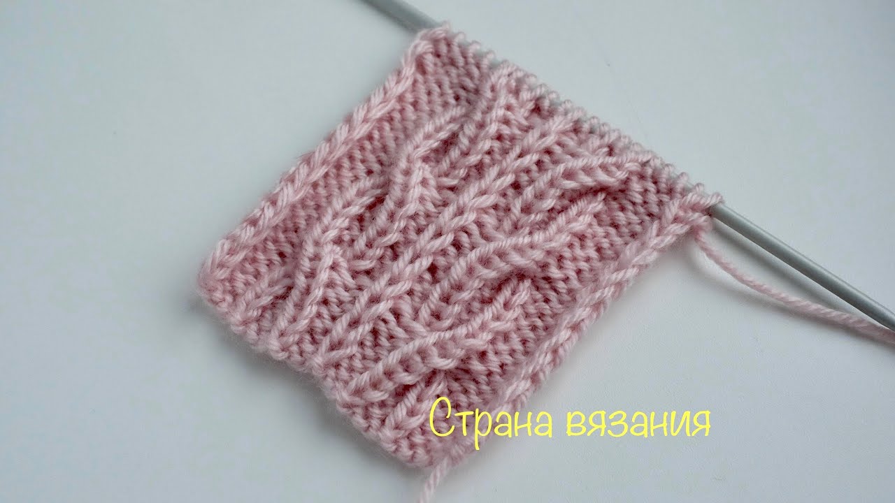 Узоры спицами. Коса со снятой петлей. Knitting patterns. The braid with the loop removed.