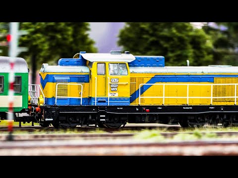 Realistic model railway with diesel and steam trains!