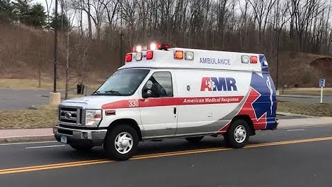 AMR Ambulance 330 responding with Wail, yelp, Priority, and Horn