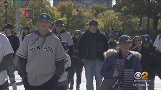Yankee fans return to Yankee Stadium for postponed game