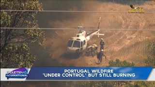 Portugal wildfire 'under control' but still burning